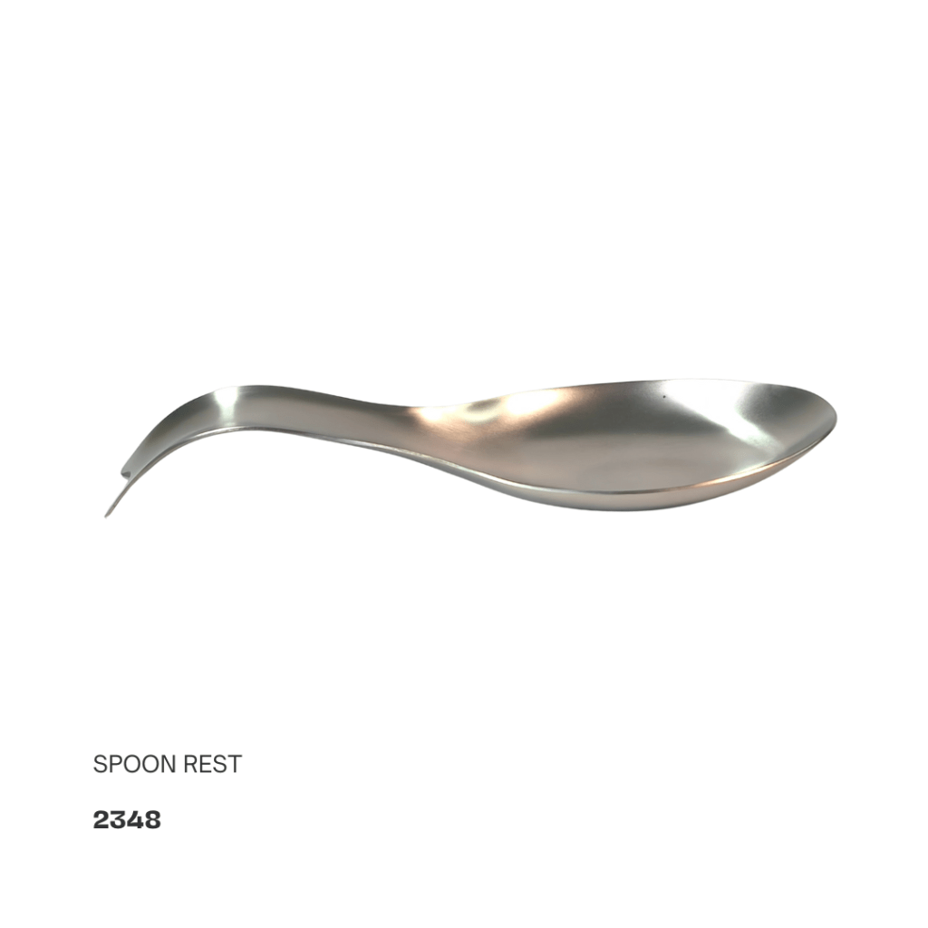 Spoon rest with a sleek, curved design, made of polished metal.