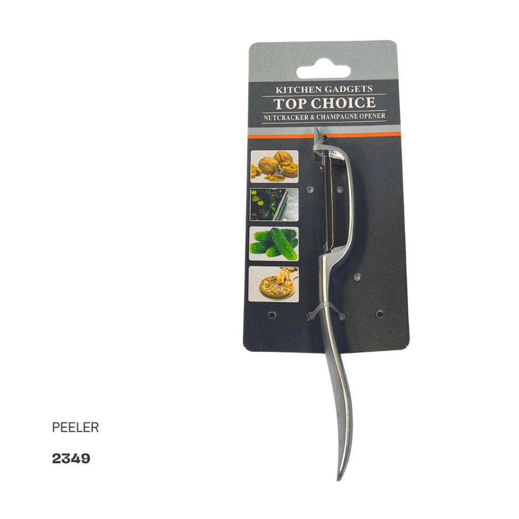 A stainless steel peeler displayed on a card labeled 'KITCHEN GADGETS TOP CHOICE NUTCRACKER & CHAMPAGNE OPENER'. The card features images of nuts, cucumbers, and a dish.