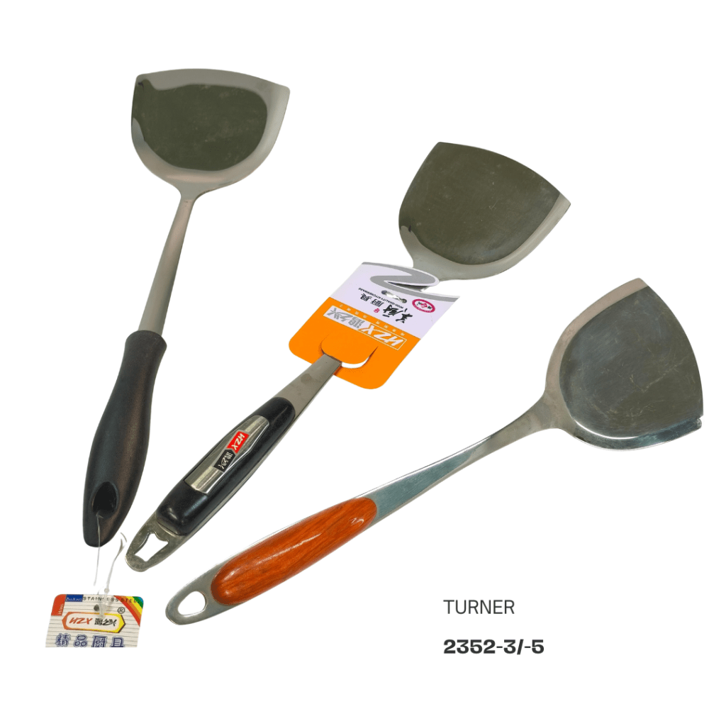 Three metal turners with different handles are arranged together, showing their flat, rounded blades. One turner has a black handle, another has a wooden handle, and the third is tagged with product information.