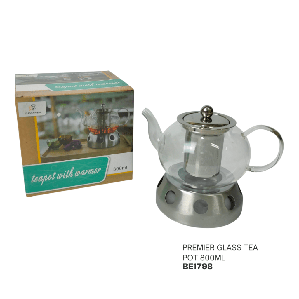 A transparent glass teapot with a stainless steel warmer, featuring a built-in tea infuser. Packaging box labeled 'teapot with warmer 800ml' is visible in the background.
