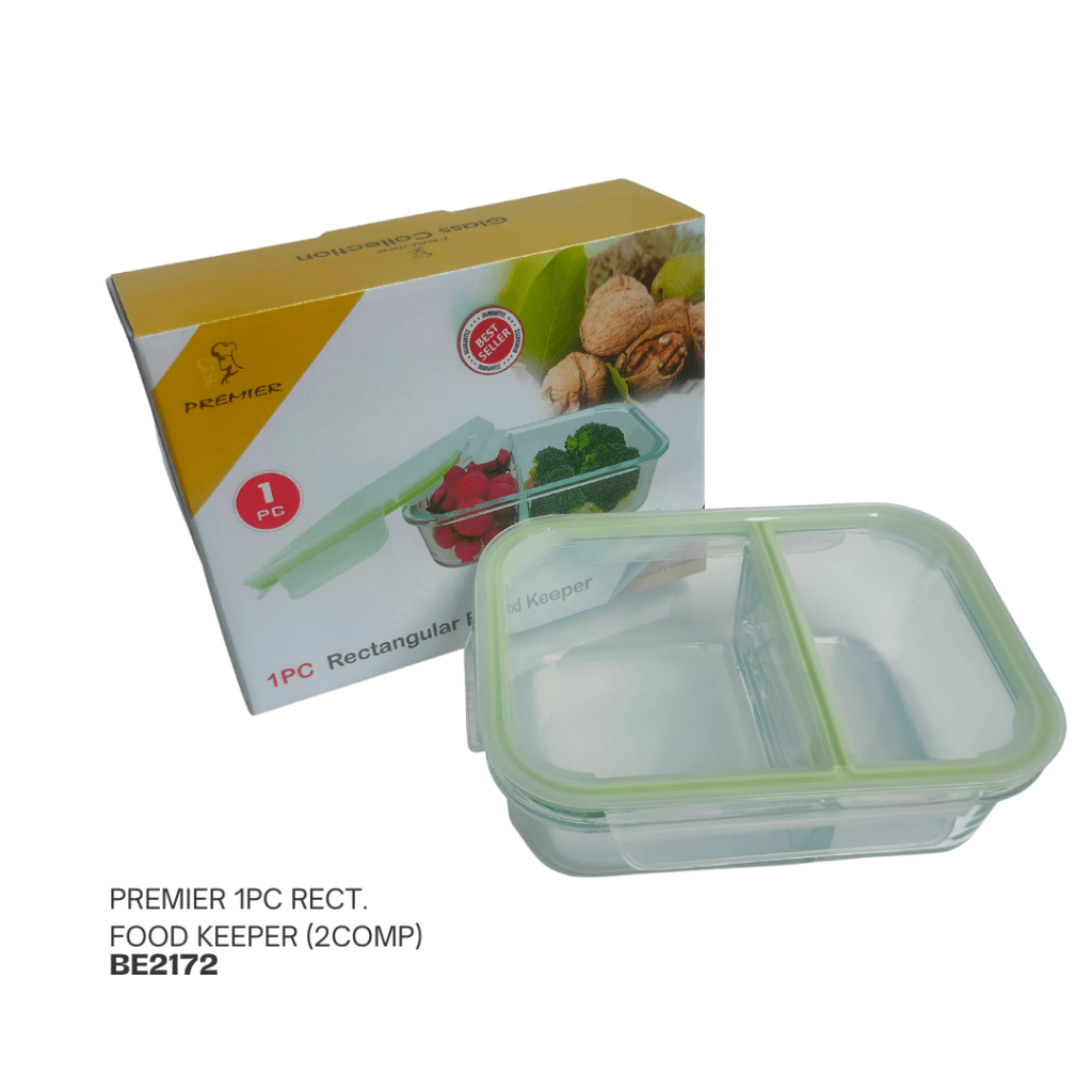 Glass food storage container with a green locking lid and a rectangular shape, displayed alongside its packaging.