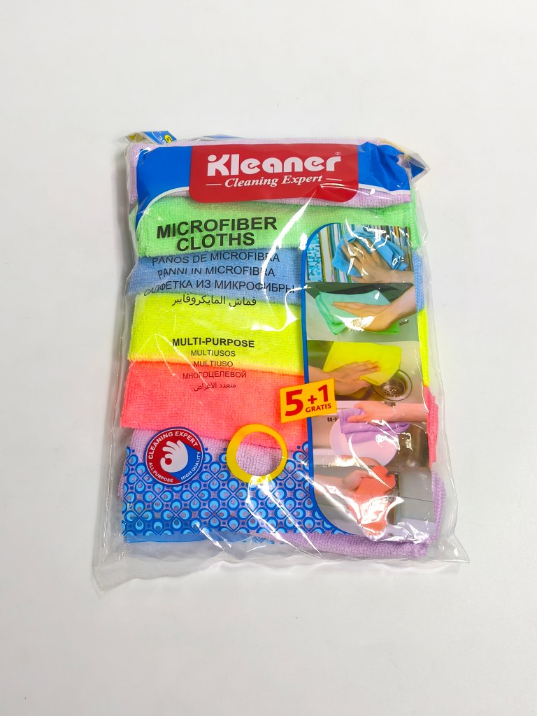 Pack of microfiber cleaning cloths including five colorful cloths and one bonus cloth, labeled as multi-purpose and featuring images of cleaning tasks.