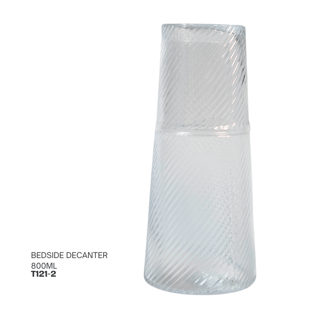 Clear glass bedside decanter with a textured pattern, 800ml capacity.